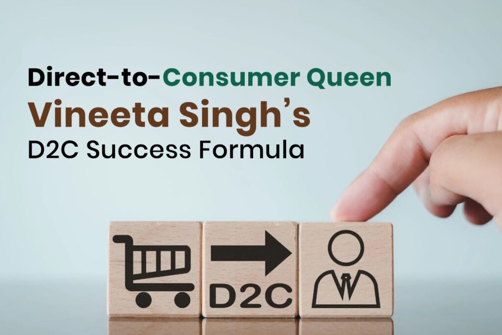 Hand pointing at wooden blocks showing a shopping cart, D2C text, and a user icon, symbolizing Vineeta Singh's direct-to-consumer success formula.