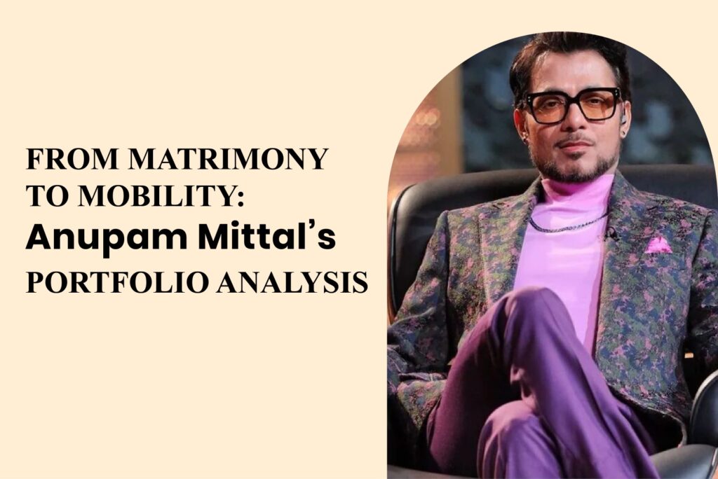 Anupam Mittal in a stylish suit seated confidently, representing his journey from Shaadi.com to a diverse startup portfolio.