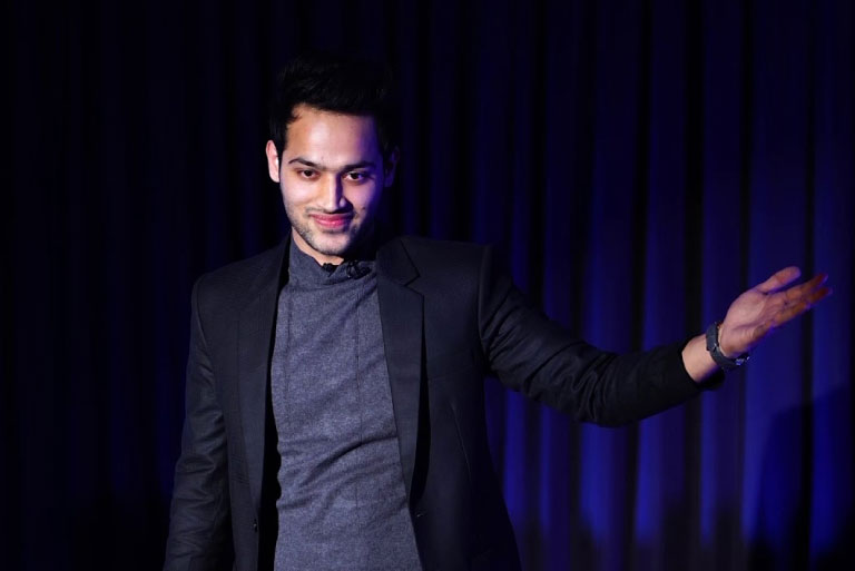 Raj Shamani delivering a keynote speech on business and entrepreneurship.